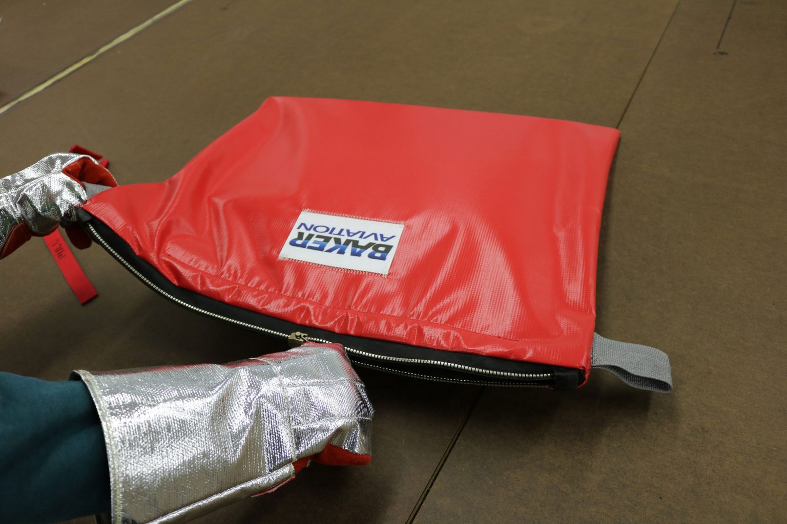Airplanes to be equipped with fire-containment bags